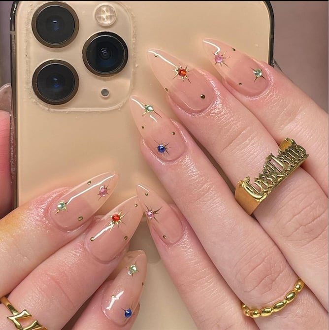 Short Almond Nails with Gold Studs and Star Rhinestones Short Almond Nails with Gold Studs and Star Rhinestones — Baddie Nails