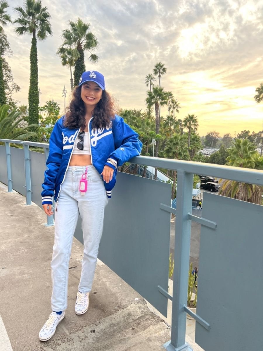 Blue Satin Bomber Jacket With Jeans And Crop Top Blue Satin Bomber Jacket With Jeans And Crop Top — Baseball Game Outfits