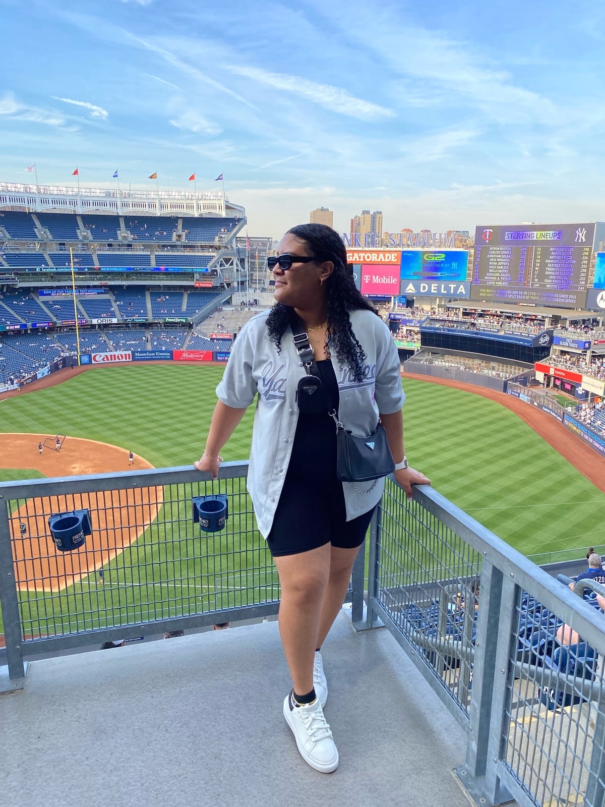 Gray Baseball Jersey Over Black Tank Top And Bike Shorts Gray Baseball Jersey Over Black Tank Top And Bike Shorts — Baseball Game Outfits
