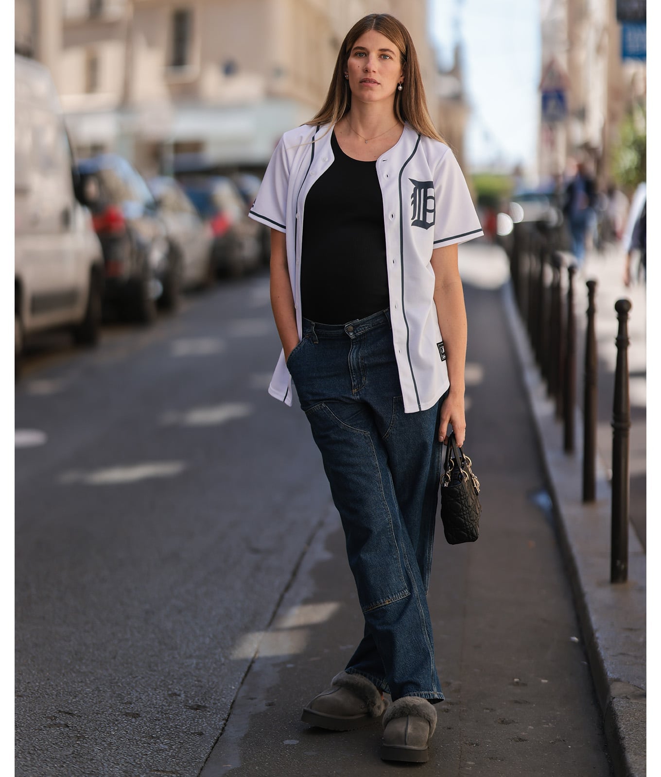 White Baseball Jersey Over Black T-Shirt And Wide-Leg Jeans White Baseball Jersey Over Black T-Shirt And Wide-Leg Jeans — Baseball Game Outfits