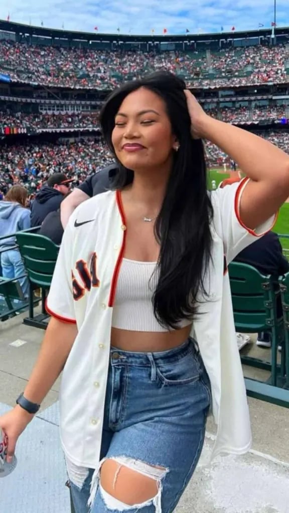 White Crop Top With Baseball Jersey And Ripped Jeans White Crop Top With Baseball Jersey And Ripped Jeans — Baseball Game Outfits