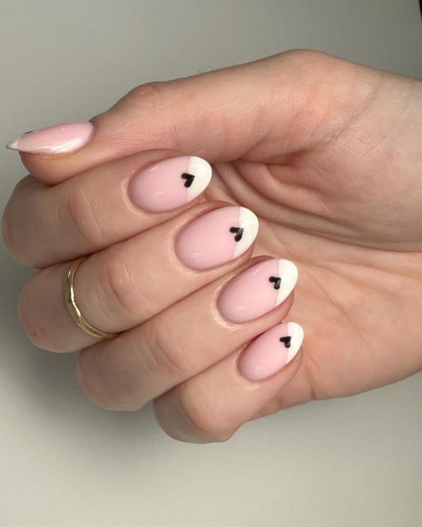 Medium Oval Pale Pink French With Black Hearts Medium Oval Pale Pink French With Black Hearts — Basic Nails