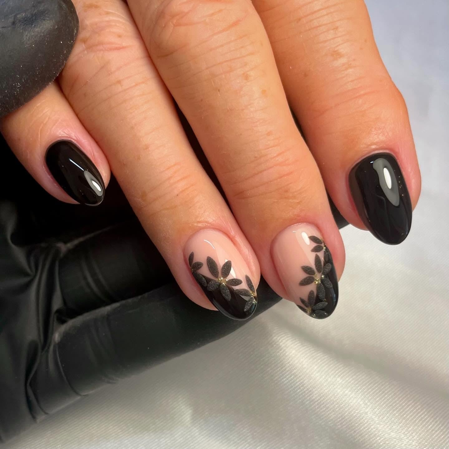 Medium Almond Glossy Black With Floral Accents Medium Almond Glossy Black With Floral Accents — Black Nails
