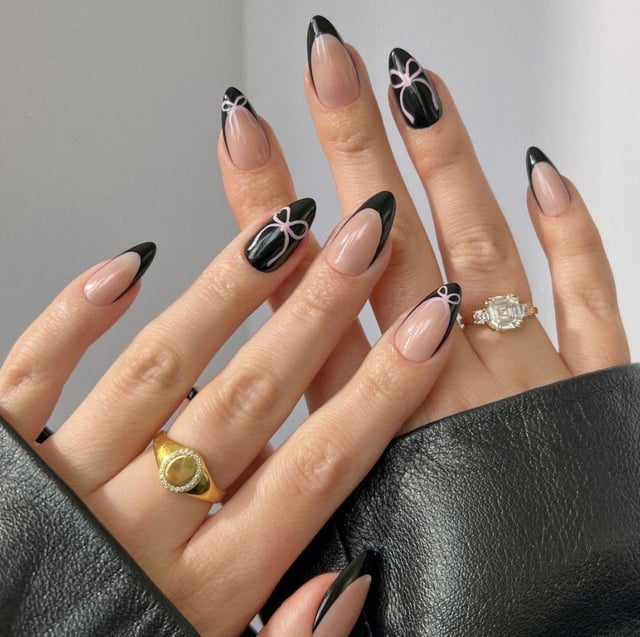 Medium Almond Nude With Black French Tips And Pink Bows Medium Almond Nude With Black French Tips And Pink Bows — Black Nails
