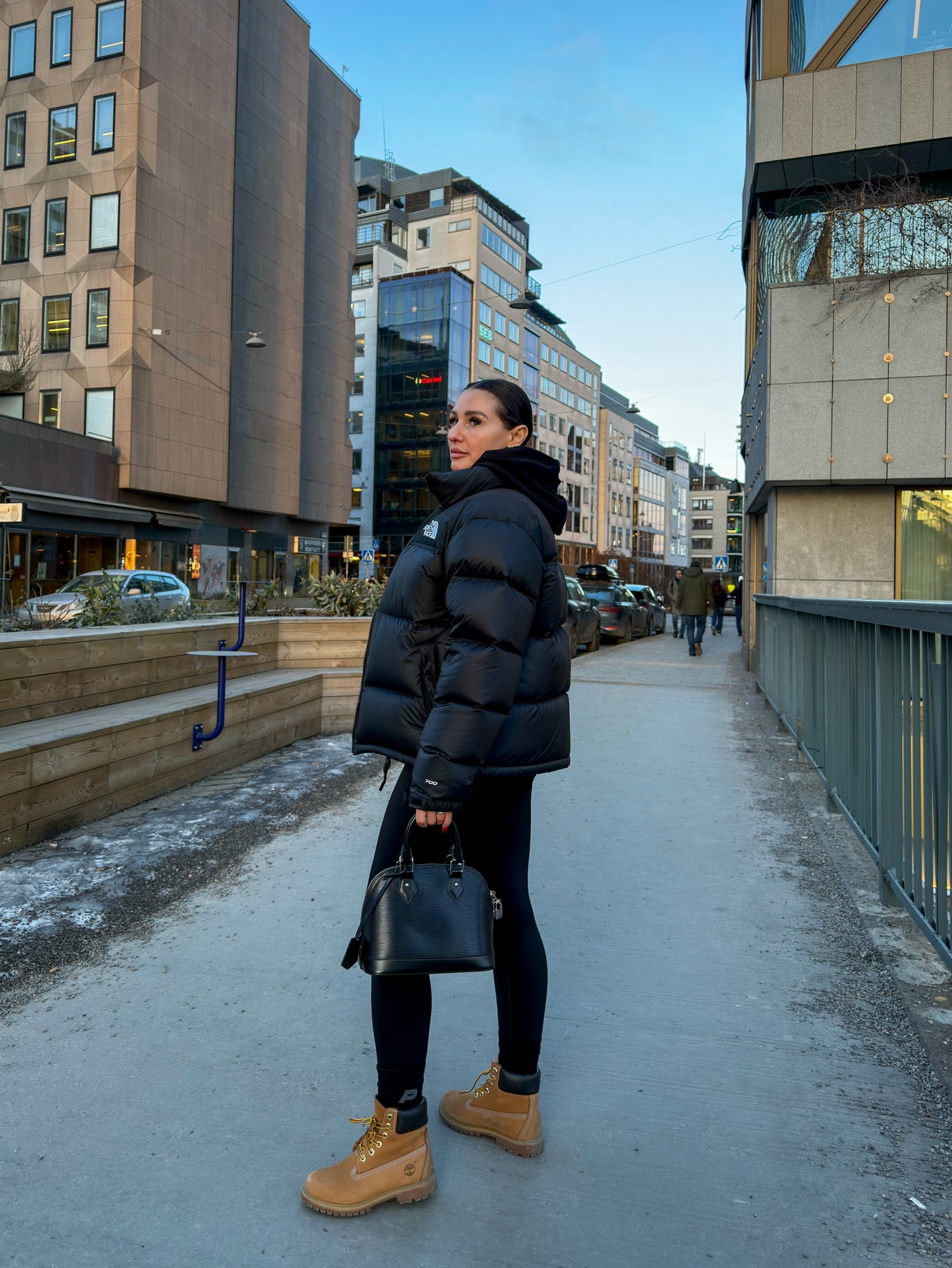 Black Puffer Jacket With Timberland Boots Street Style