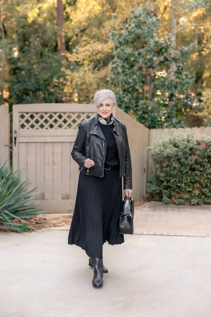 Pleated Black Midi Skirt With Leather Jacket And Scarf Pleated Black Midi Skirt With Leather Jacket And Scarf — Black Skirt Outfit