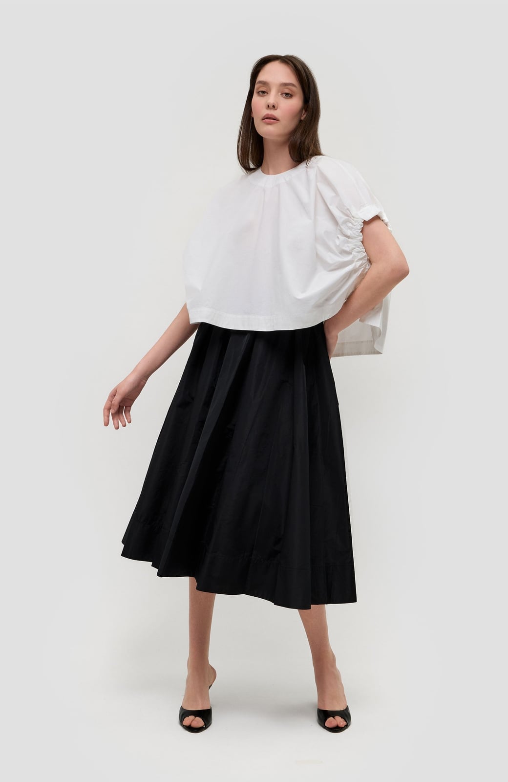 Black A-Line Midi Skirt With White Puff Sleeve Top Black A-Line Midi Skirt With White Puff Sleeve Top — Black Skirt Outfit