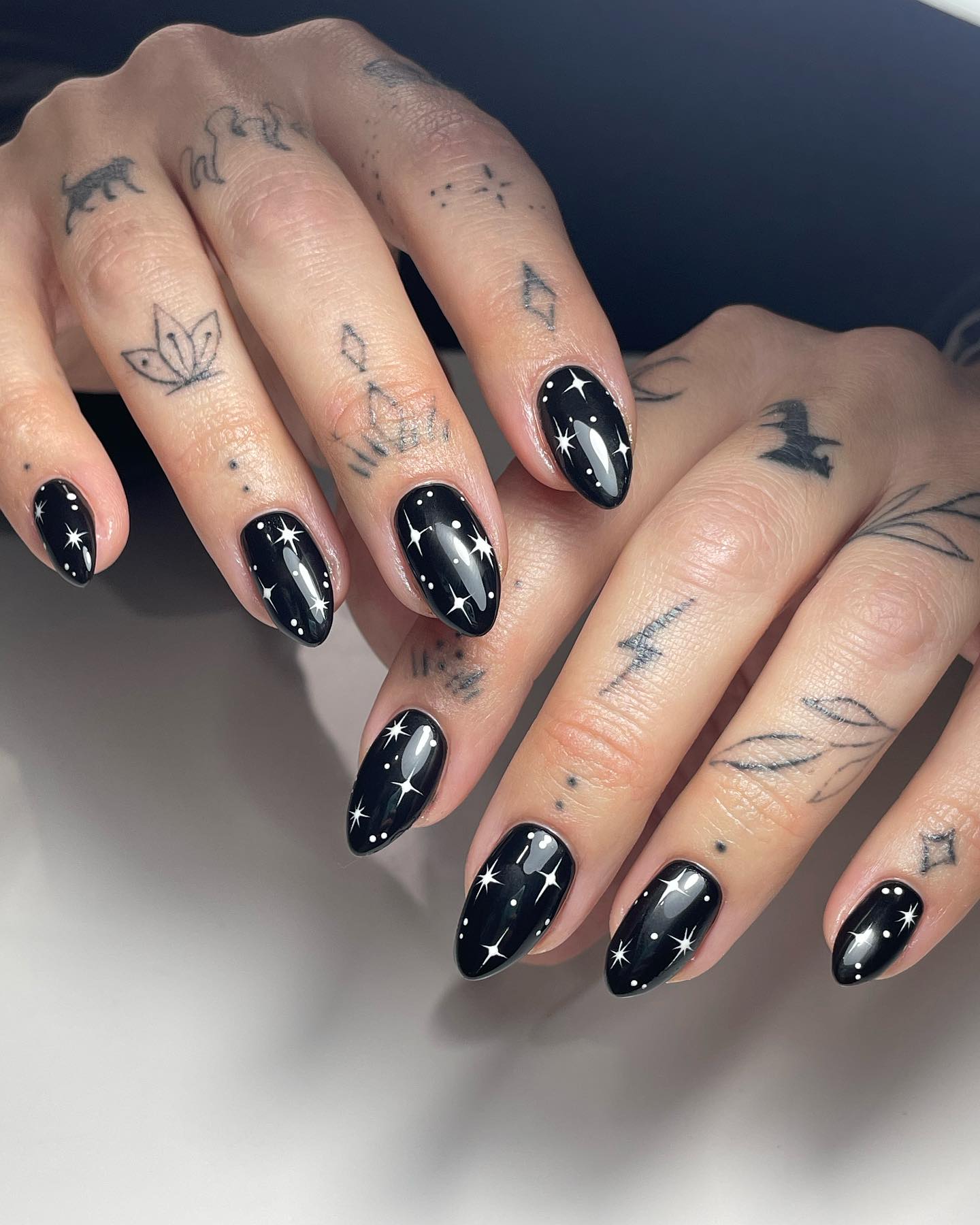 Black Starry Night Almond Nails
