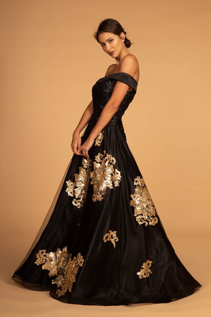 Black off-the-shoulder ballgown with gold sequin embellishments Black off-the-shoulder ballgown with gold sequin embellishments — Black Tie Dresses