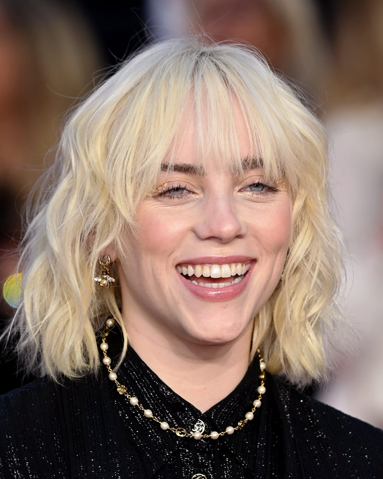 Chin Platinum Blonde Textured Bob With Wispy Bangs Chin Platinum Blonde Textured Bob With Wispy Bangs — Blonde Bangs