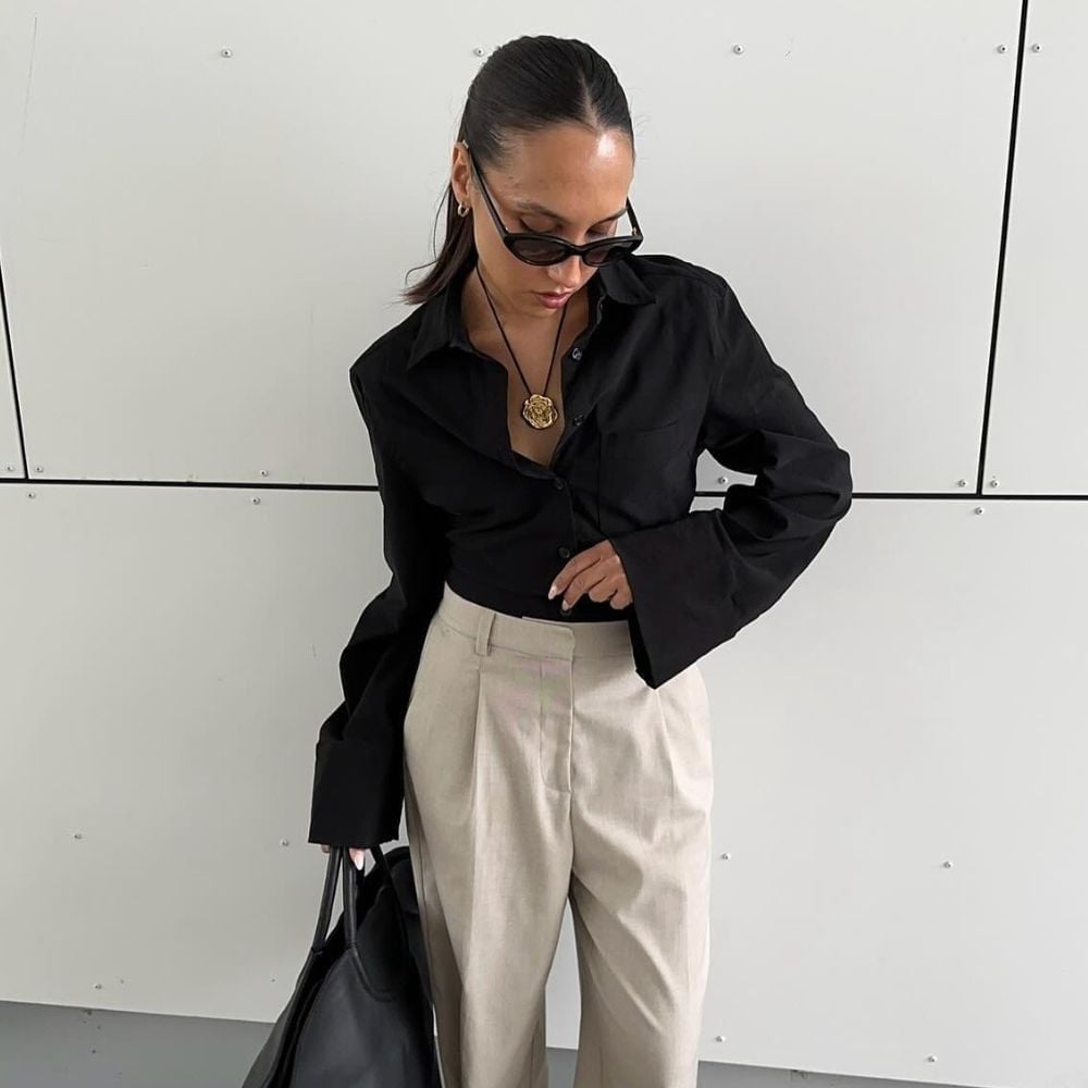 Black Oversized Shirt With Bell Sleeves And Beige Trousers Black Oversized Shirt With Bell Sleeves And Beige Trousers — Blouse Outfits