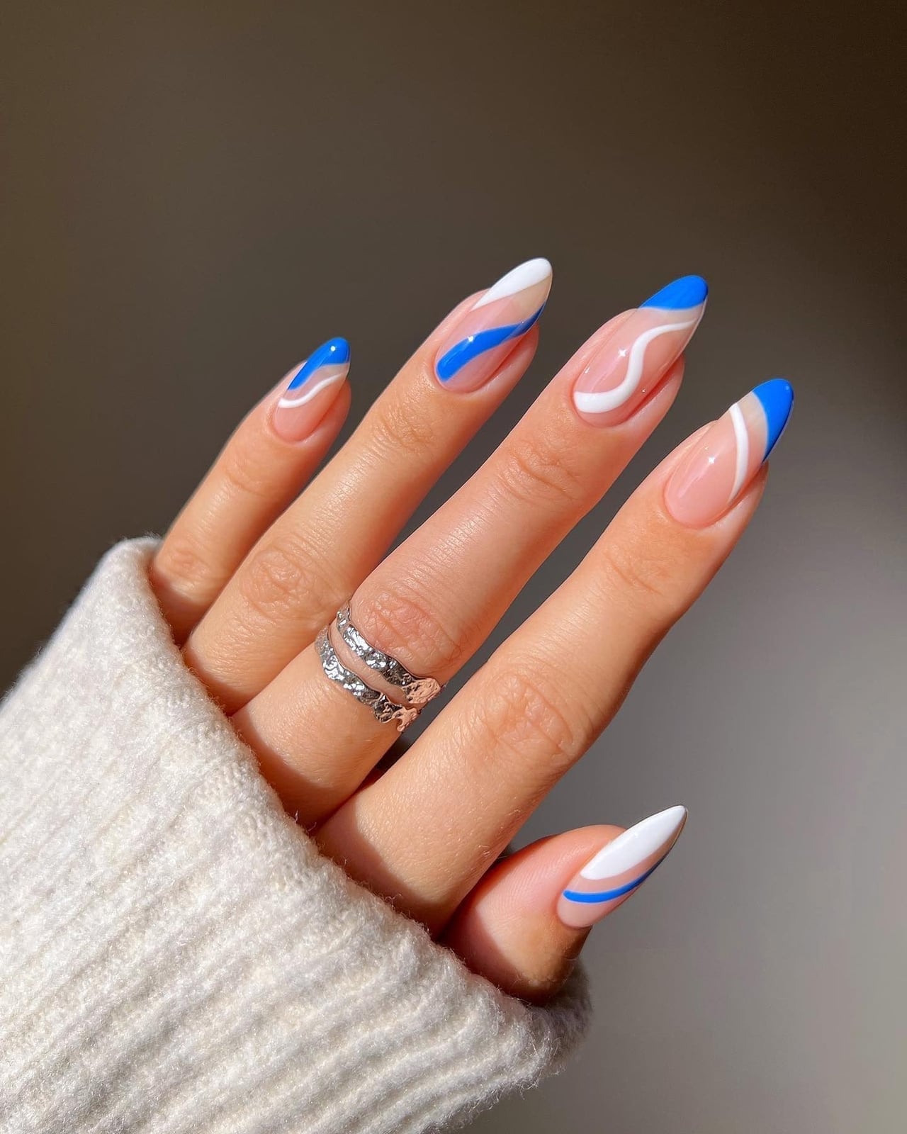 Blue White Abstract Swirls Medium Almond Nails Blue White Abstract Swirls Medium Almond Nails — Blue Almond Nails
