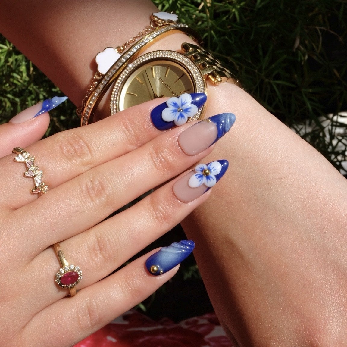 Deep Blue Marbled 3D Flower Medium Almond Nails Deep Blue Marbled 3D Flower Medium Almond Nails — Blue Almond Nails