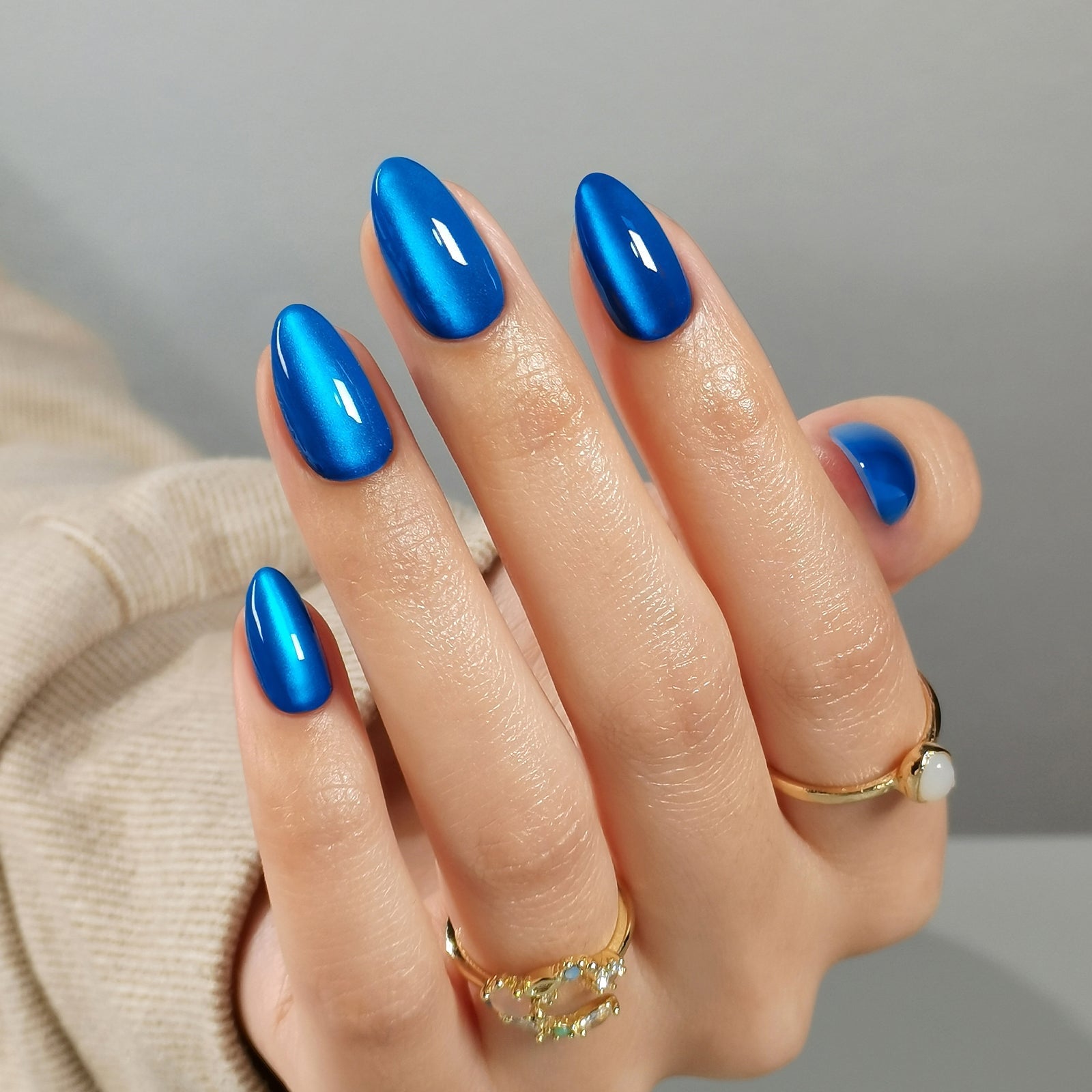 Vibrant Blue Cat-Eye Short Almond Nails, Creating A Dynamic Vibrant Blue Cat-Eye Short Almond Nails, Creating A Dynamic — Blue Almond Nails