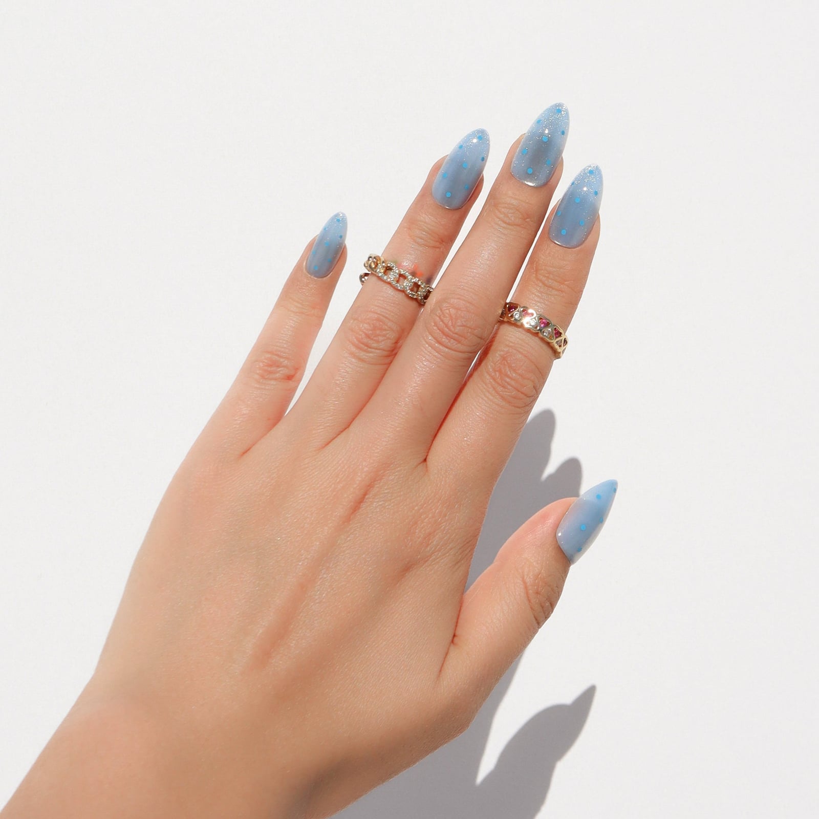 Sheer Light Blue Shimmer Dots Medium Almond Nails Sheer Light Blue Shimmer Dots Medium Almond Nails — Blue Almond Nails