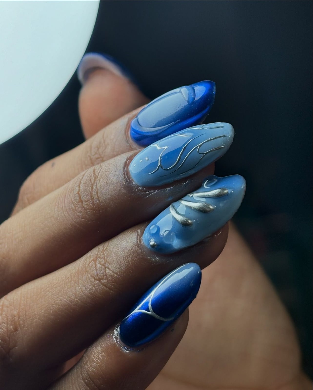 Blue Gradient Water Droplet Medium Almond Nails Blue Gradient Water Droplet Medium Almond Nails — Blue Almond Nails