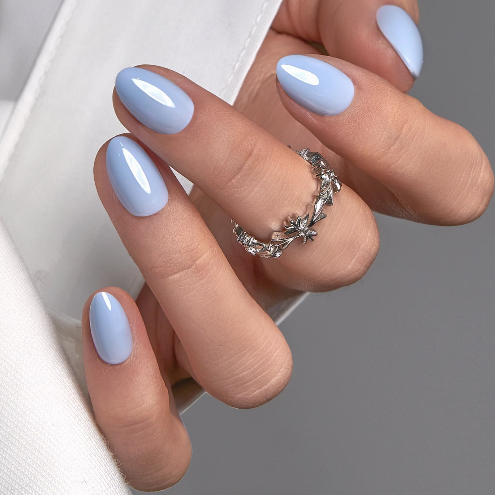 Opaque Light Blue Glossy Short Almond Nails Opaque Light Blue Glossy Short Almond Nails — Blue Almond Nails