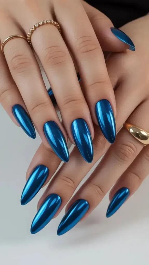 Electric Blue Chrome Medium Almond Electric Blue Chrome Medium Almond — Blue Chrome Nails