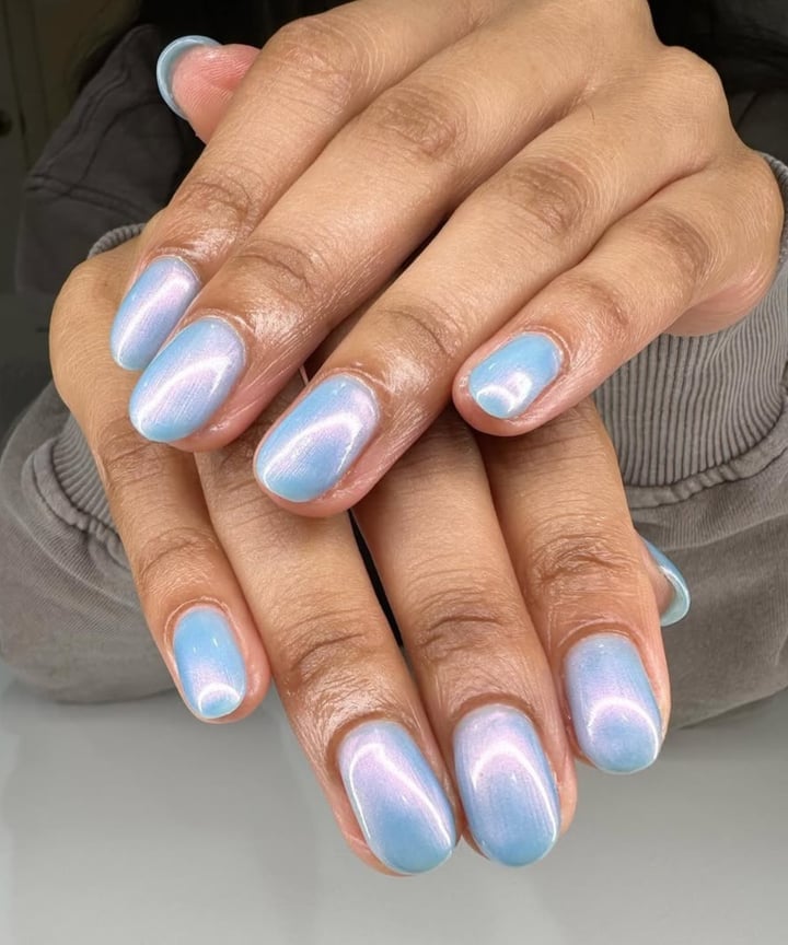 Deep Blue Chrome Medium Almond Resting, Close-Up Take Deep Blue Chrome Medium Almond Resting, Close-Up Take — Blue Chrome Nails