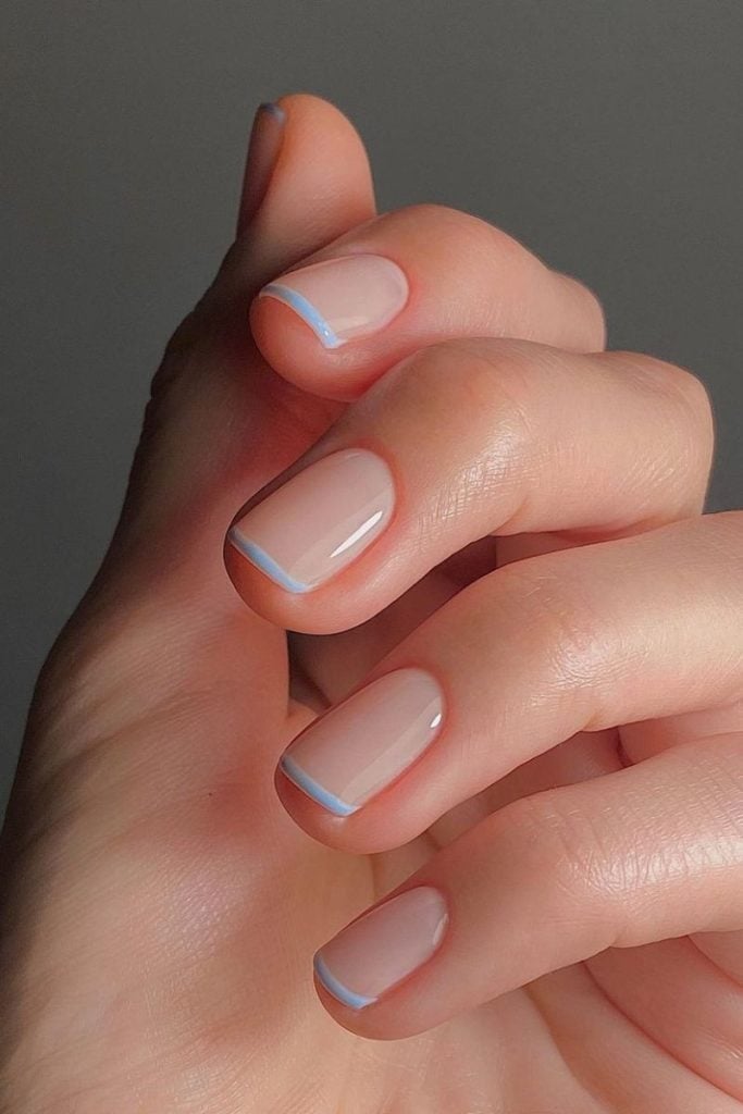 Thin Light Blue French Short Oval Nails Thin Light Blue French Short Oval Nails — Blue French Tip Nails
