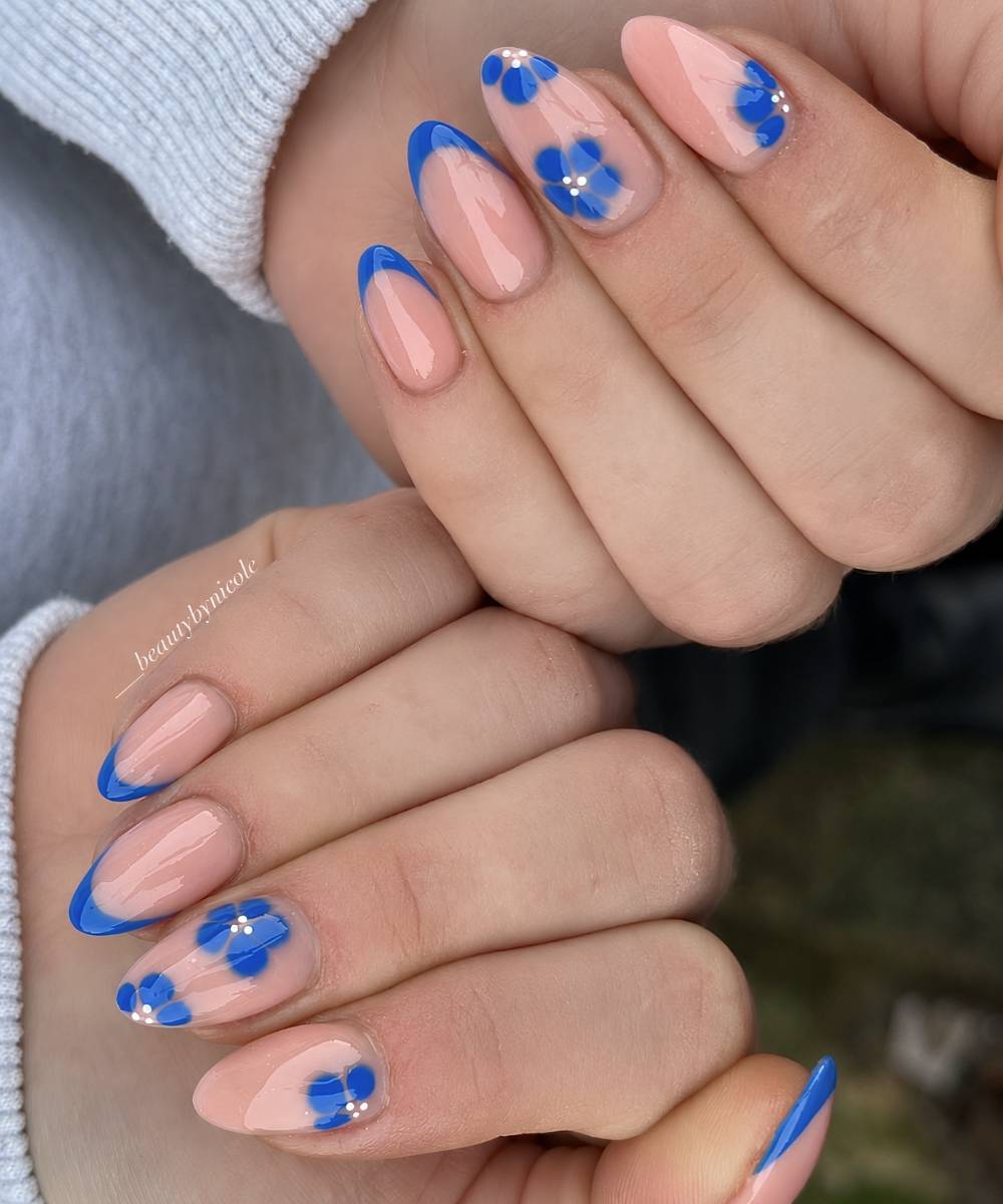 Bright Blue Floral Accents Medium Almond Nails Bright Blue Floral Accents Medium Almond Nails — Blue French Tip Nails