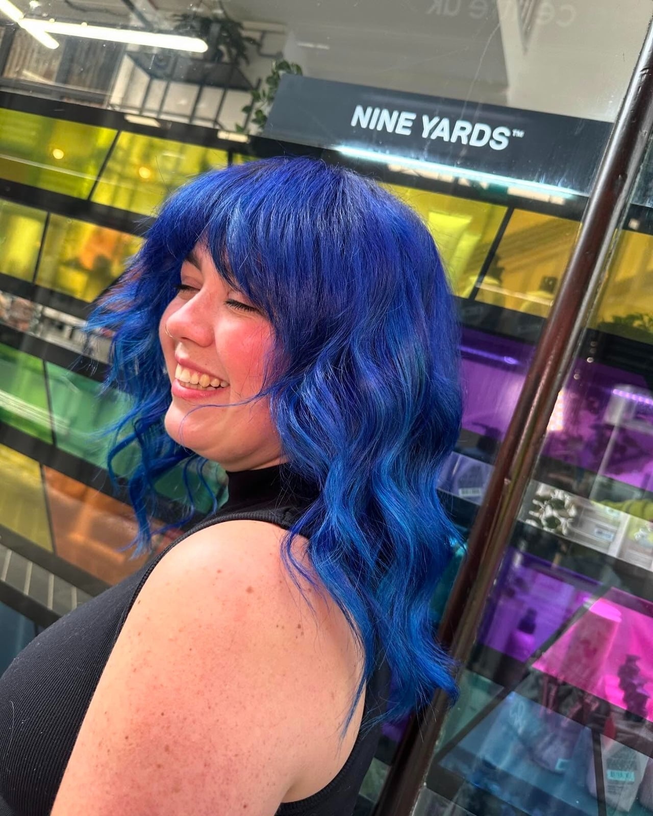 Collarbone Wavy Hair With Blue Highlights, Curtain Bangs Collarbone Wavy Hair With Blue Highlights, Curtain Bangs — Blue Hair Color