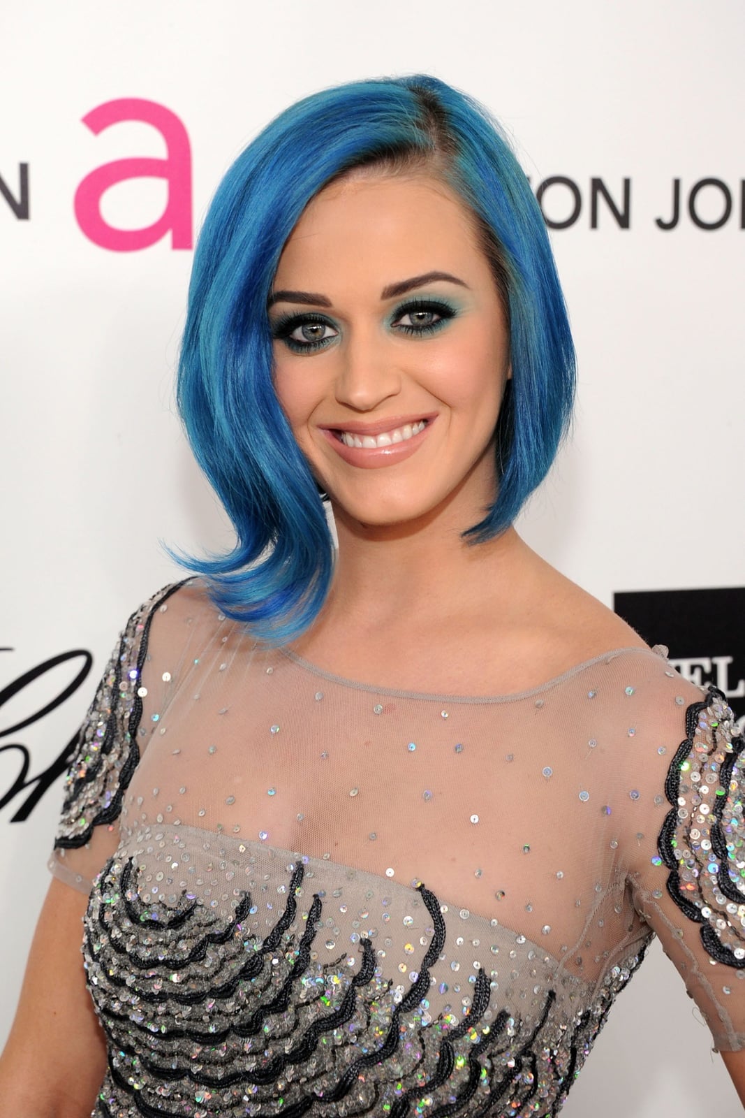 Chin Length Bob With Vibrant Blue And Side-Swept Bangs Chin Length Bob With Vibrant Blue And Side-Swept Bangs — Blue Hair Color