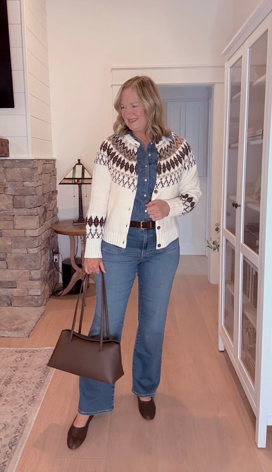 Light wash bootcut jeans with a fair isle cardigan and denim shirt Light wash bootcut jeans with a fair isle cardigan and denim shirt — Bootcut Jeans Outfits