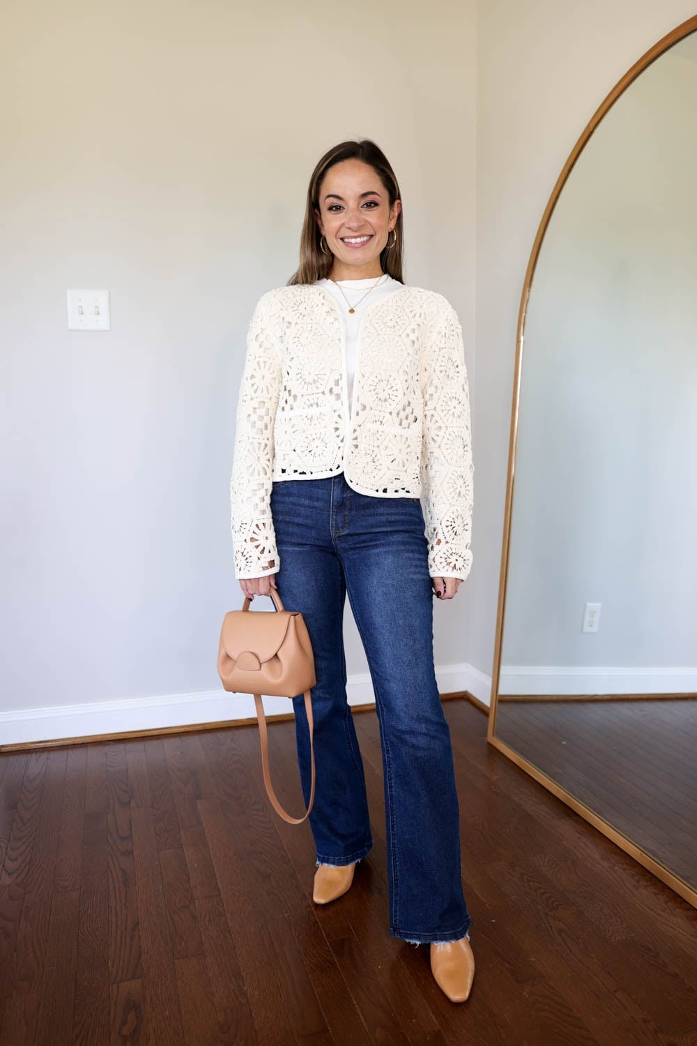 Dark wash bootcut jeans with a cream crochet jacket, Close-Up Take Dark wash bootcut jeans with a cream crochet jacket, Close-Up Take — Bootcut Jeans Outfits