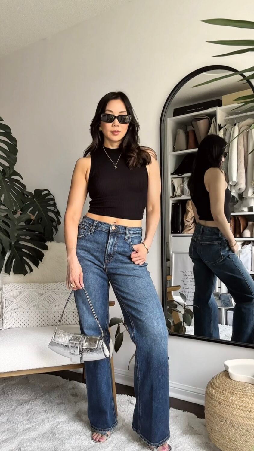 Blue bootcut jeans with a black crop top and silver heels Blue bootcut jeans with a black crop top and silver heels — Bootcut Jeans Outfits