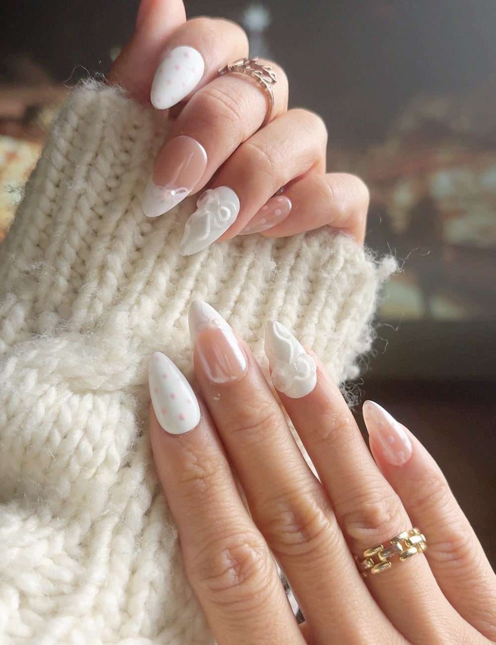White Nude Pink Medium Almond Nails With White 3D Bows, Close-Up Take White Nude Pink Medium Almond Nails With White 3D Bows, Close-Up Take — Bow Nails