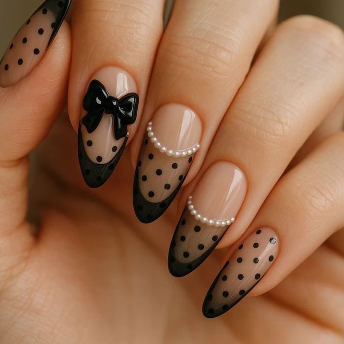 Nude Polka Dot Medium Almond Nails With 3D Black Bow Nude Polka Dot Medium Almond Nails With 3D Black Bow — Bow Nails