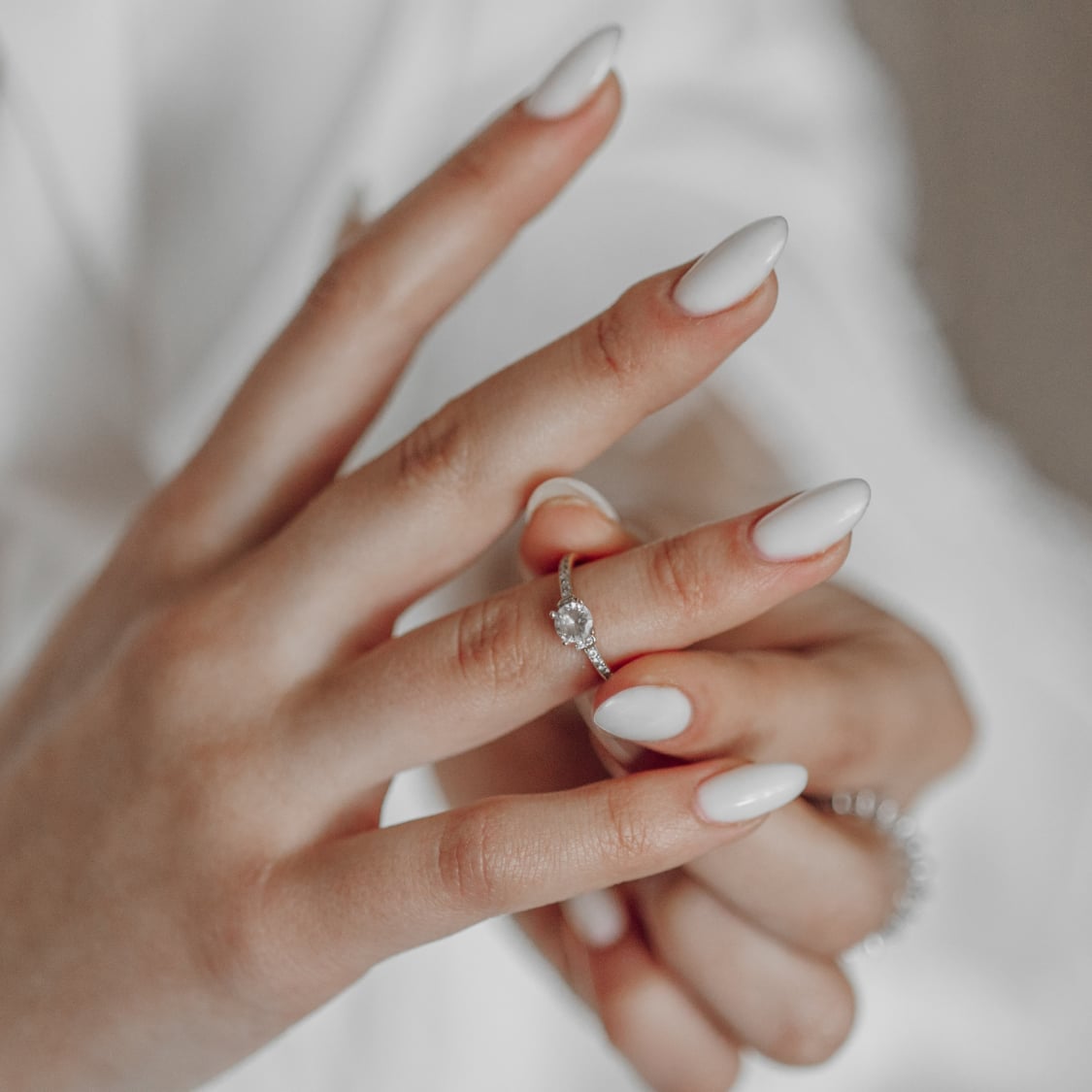Matte White Oval Nails With Crystal Accent Matte White Oval Nails With Crystal Accent — Bride Nail