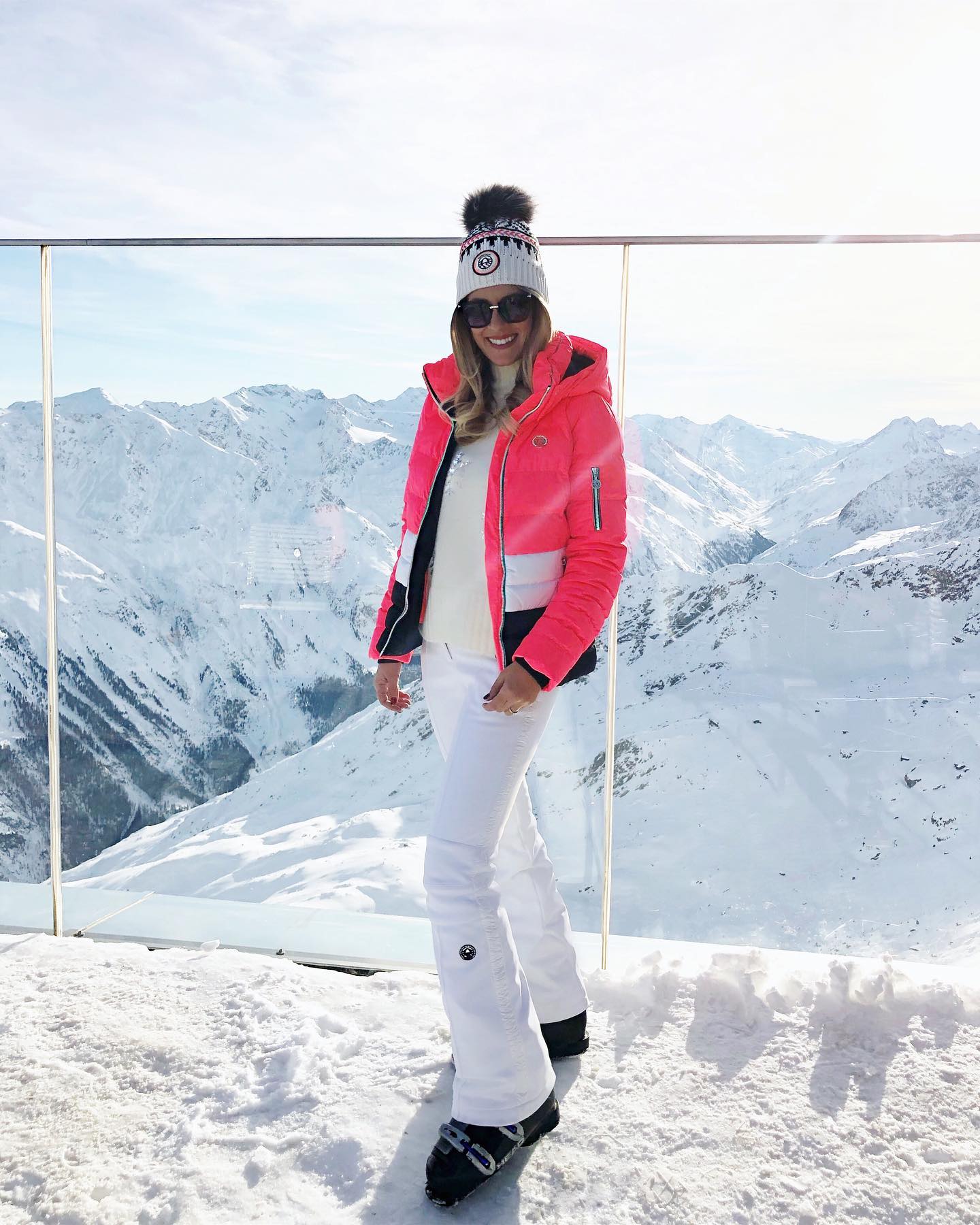 Bright Ski Jacket And White Snow Pants