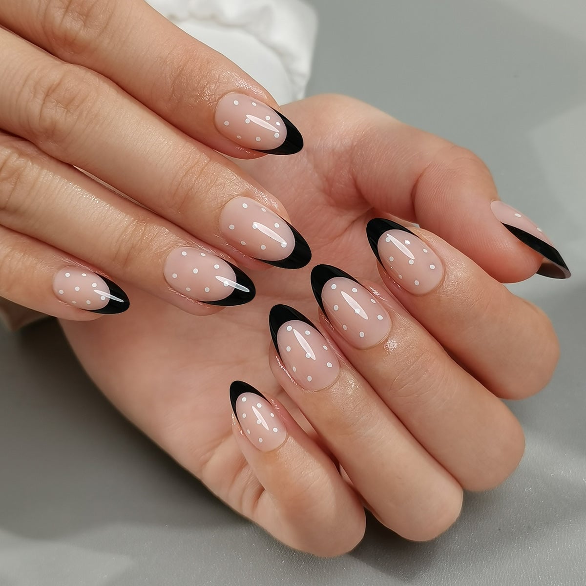 Medium Almond Black French Tips with White Polka Dots, Close-Up Take Medium Almond Black French Tips with White Polka Dots, Close-Up Take — Brown Almond Nails