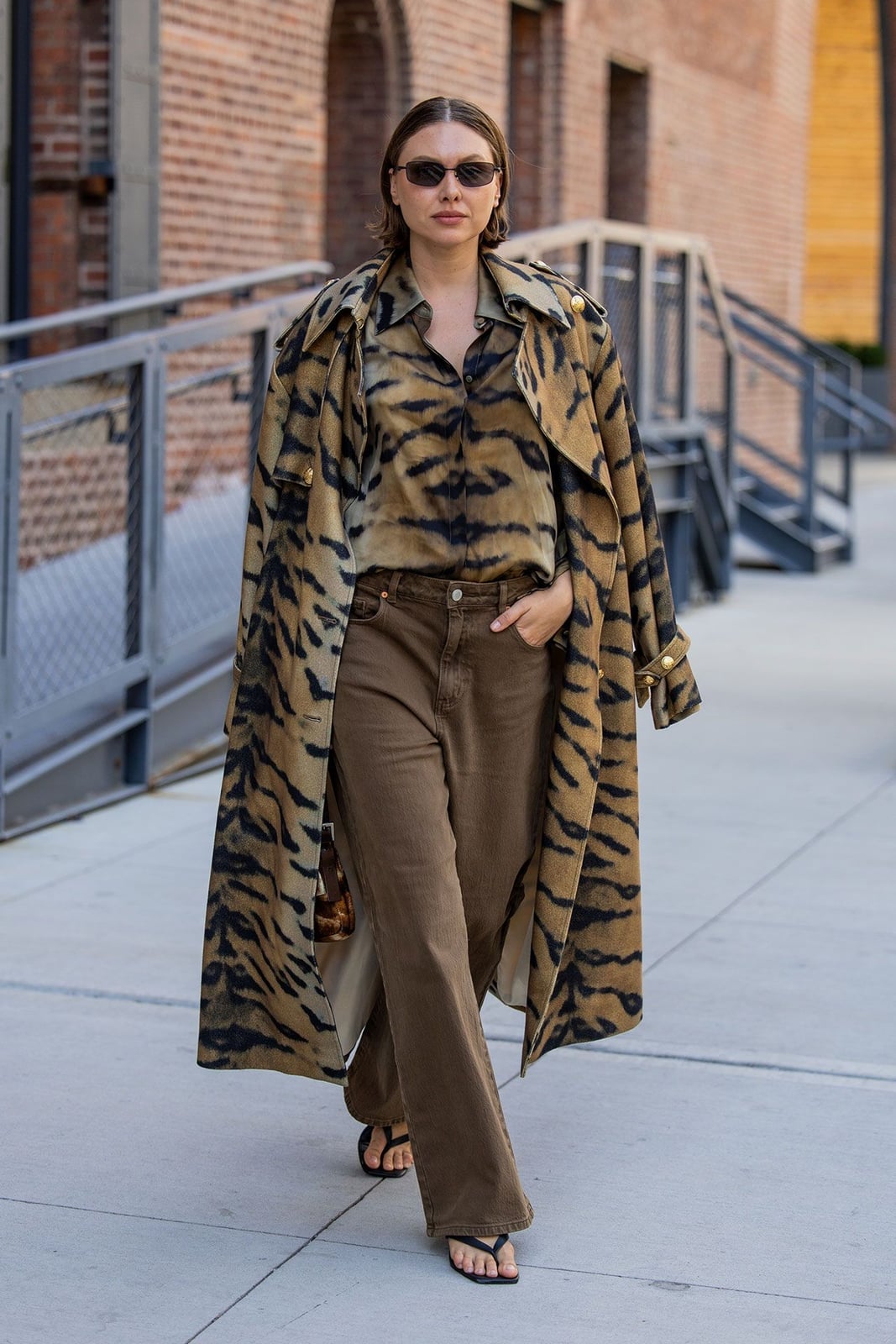 Brown straight leg jeans with brown shirt and tiger print trench coat Brown straight leg jeans with brown shirt and tiger print trench coat — Brown Jeans Outfits