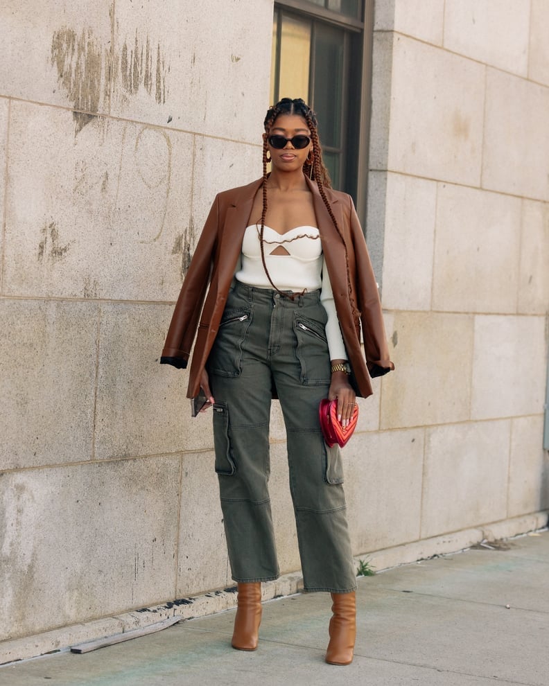 Brown Leather Blazer Draped Over Shoulders With Cargo Pants Brown Leather Blazer Draped Over Shoulders With Cargo Pants — Brown Leather Jacket Outfit