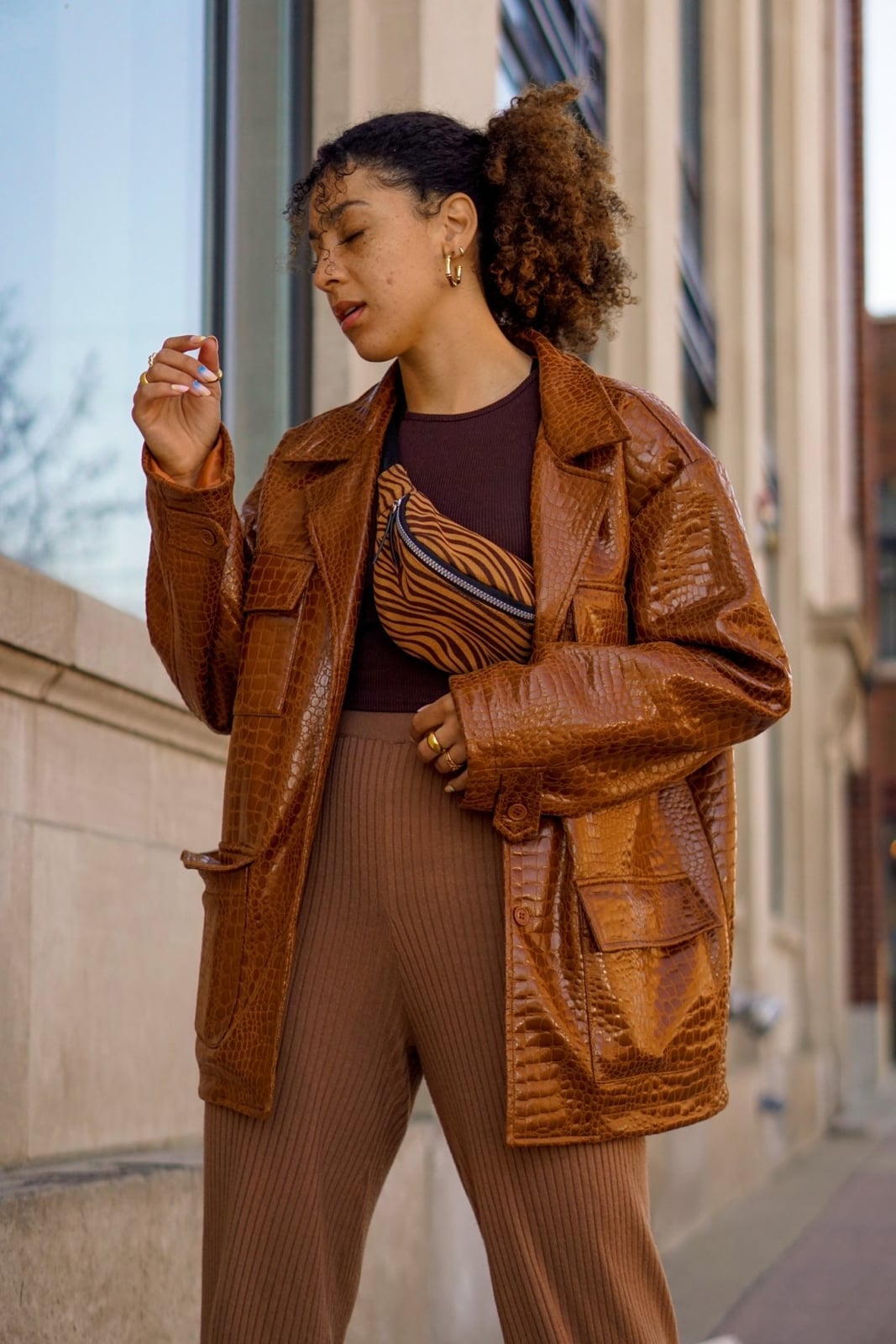 Textured Brown Patent Jacket With Tan Wide-Leg Pants Textured Brown Patent Jacket With Tan Wide-Leg Pants — Brown Leather Jacket Outfit