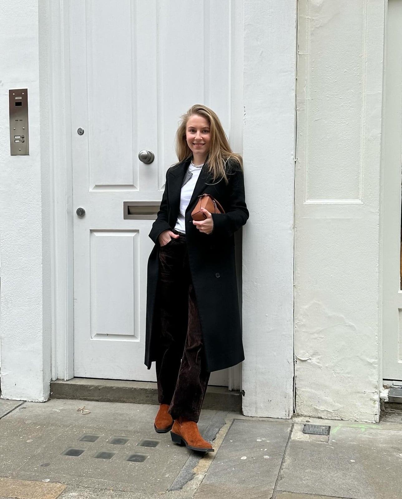 Brown Corduroy Trousers With White Tee and Black Coat Brown Corduroy Trousers With White Tee and Black Coat — Brown Pants Outfits