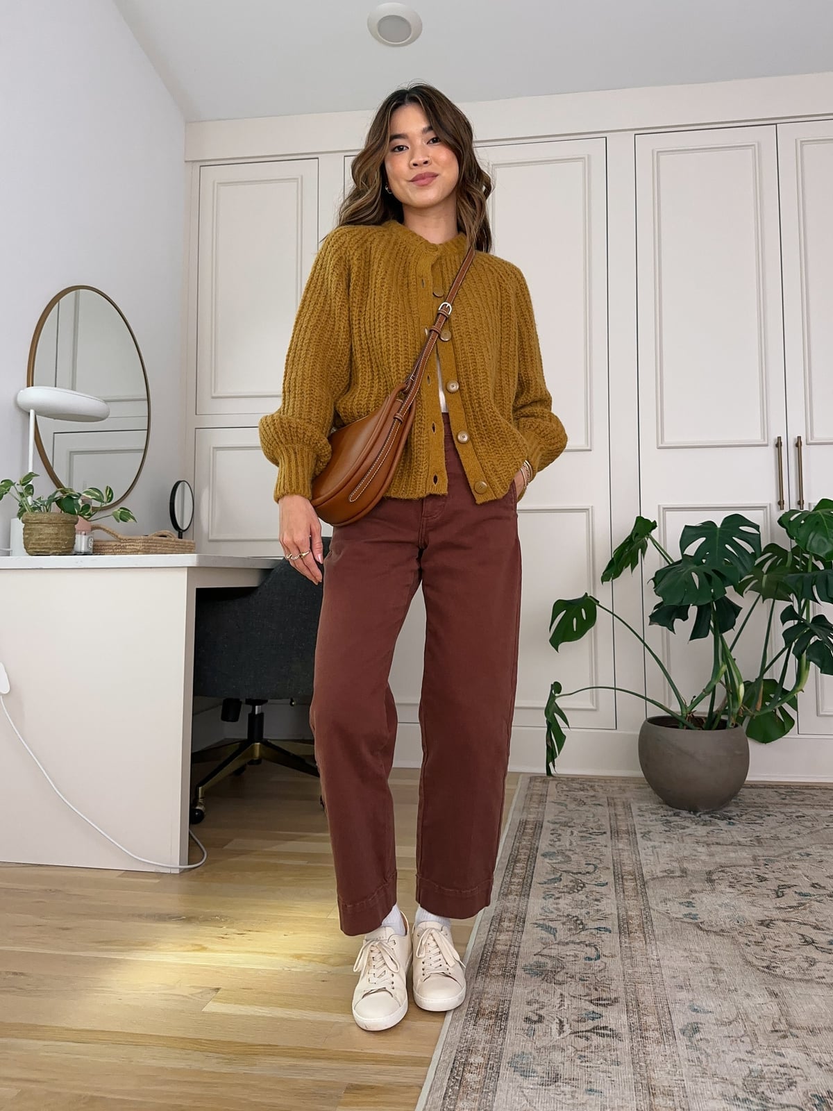 Ochre cardigan over camisole with brown pants Ochre cardigan over camisole with brown pants — Brown Sweater Outfit