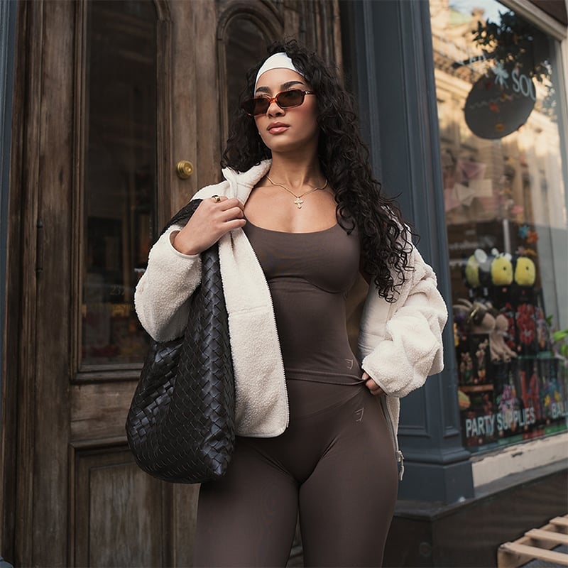Brown Bodysuit Under Cream Fleece Jacket Brown Bodysuit Under Cream Fleece Jacket — Brown Top Outfits