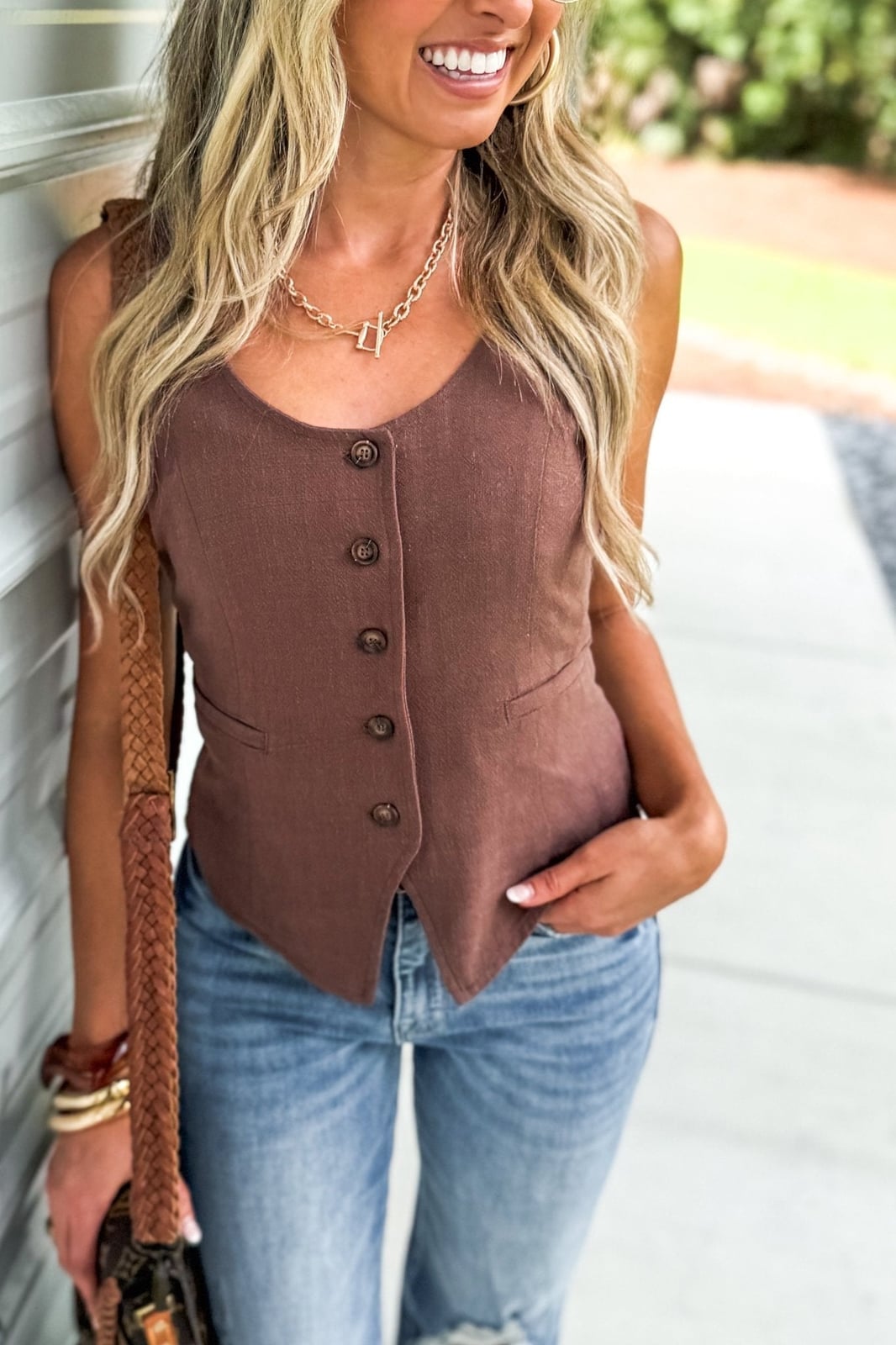 Brown Button-Up Vest Over Blue Jeans Brown Button-Up Vest Over Blue Jeans — Brown Top Outfits