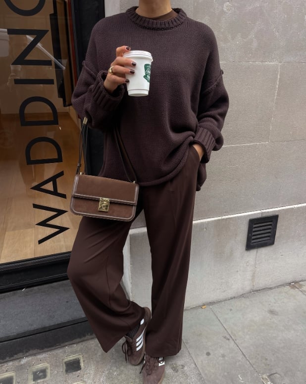 Oversized Knit Sweater With Wide-Leg Brown Trousers, Close-Up Take Oversized Knit Sweater With Wide-Leg Brown Trousers, Close-Up Take — Brown Trousers Outfit