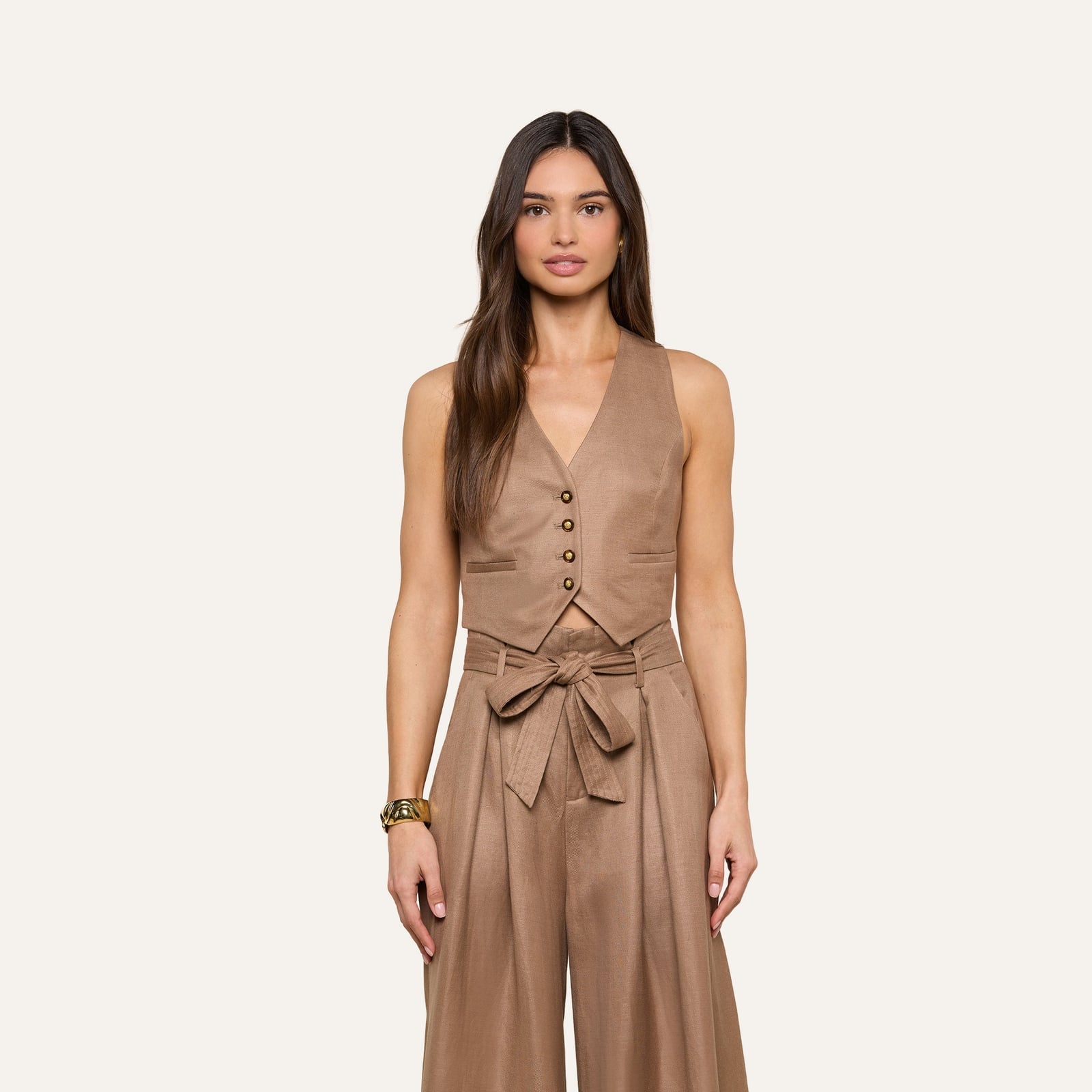 Cropped brown waistcoat with tie-waist detail and wide-leg trousers Cropped brown waistcoat with tie-waist detail and wide-leg trousers — Brown Vest Outfit