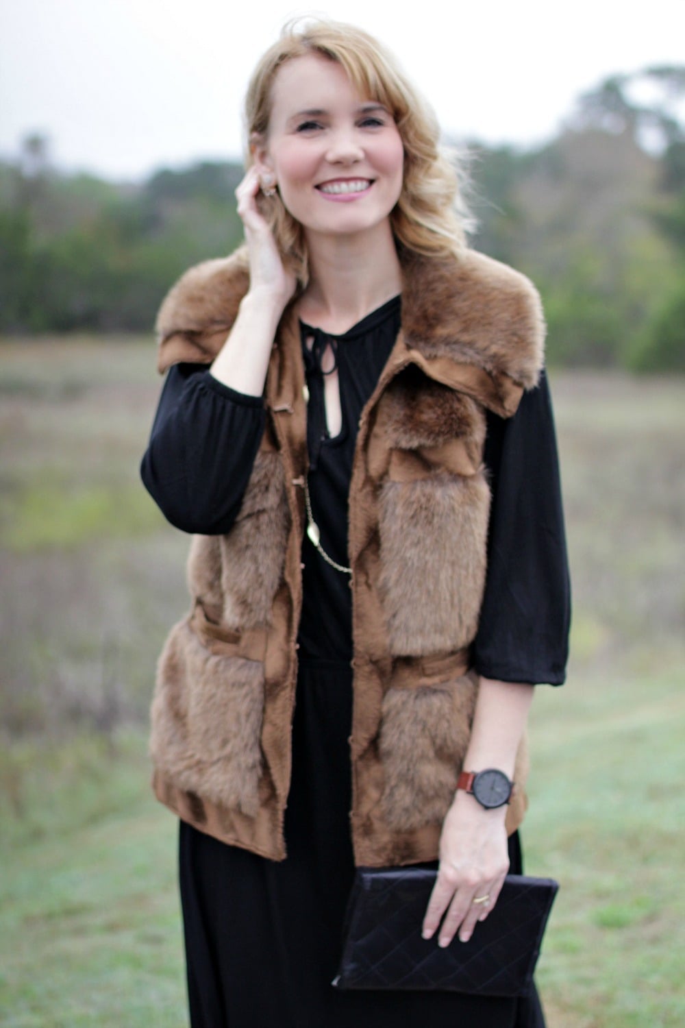 Brown fur vest over black long-sleeve dress, Close-Up Take Brown fur vest over black long-sleeve dress, Close-Up Take — Brown Vest Outfit