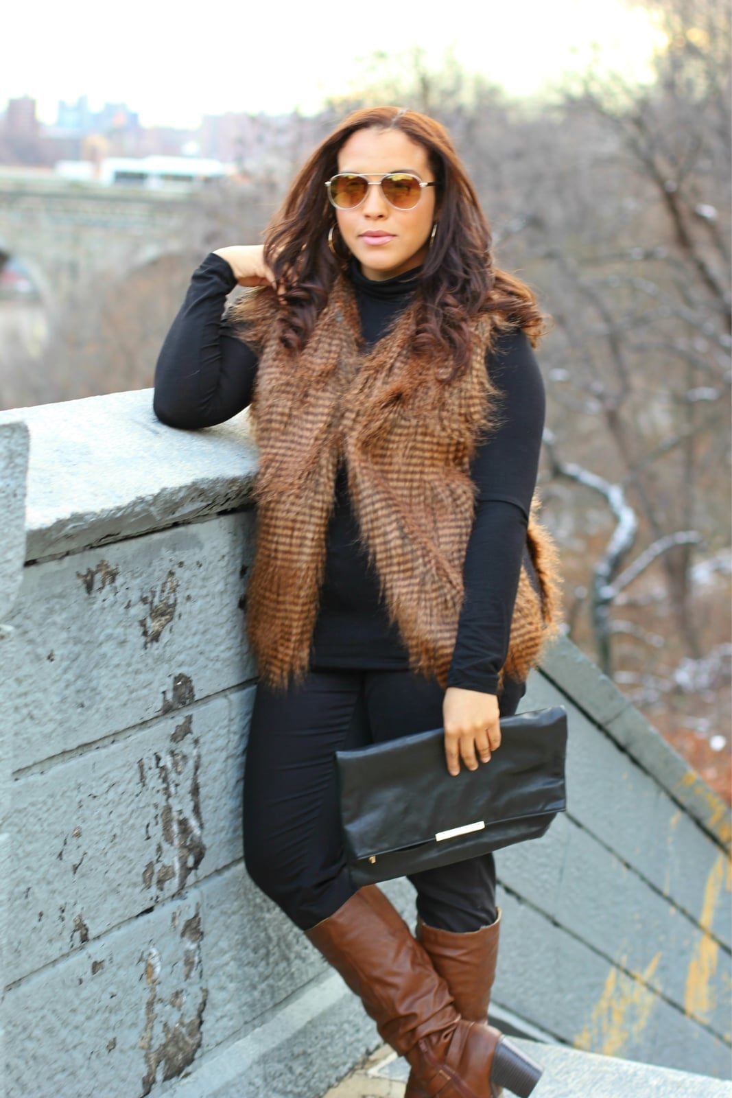 Two-tone brown faux fur vest over black turtleneck and slim pants Two-tone brown faux fur vest over black turtleneck and slim pants — Brown Vest Outfit