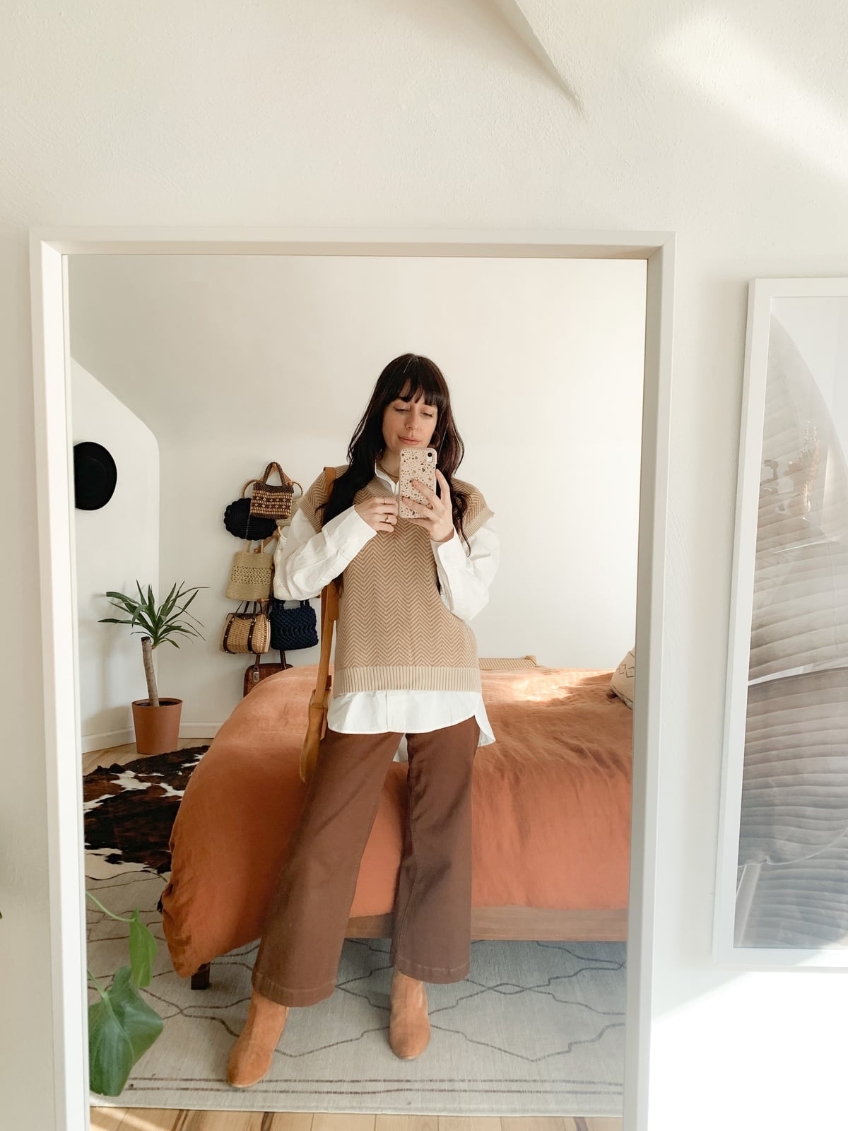 Beige sweater vest over white shirt with brown pants Beige sweater vest over white shirt with brown pants — Brown Vest Outfit