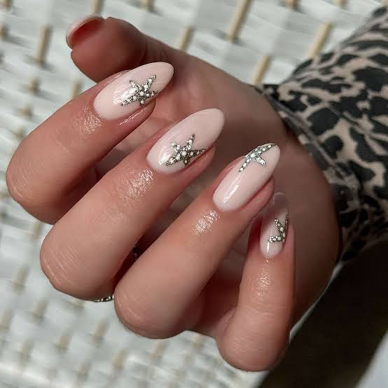 Short Almond Pale Pink With Silver Stars Short Almond Pale Pink With Silver Stars — Builder Gel Nails