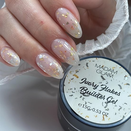 Medium Oval Jelly Nude With Gold Silver Flakes Medium Oval Jelly Nude With Gold Silver Flakes — Builder Gel Nails