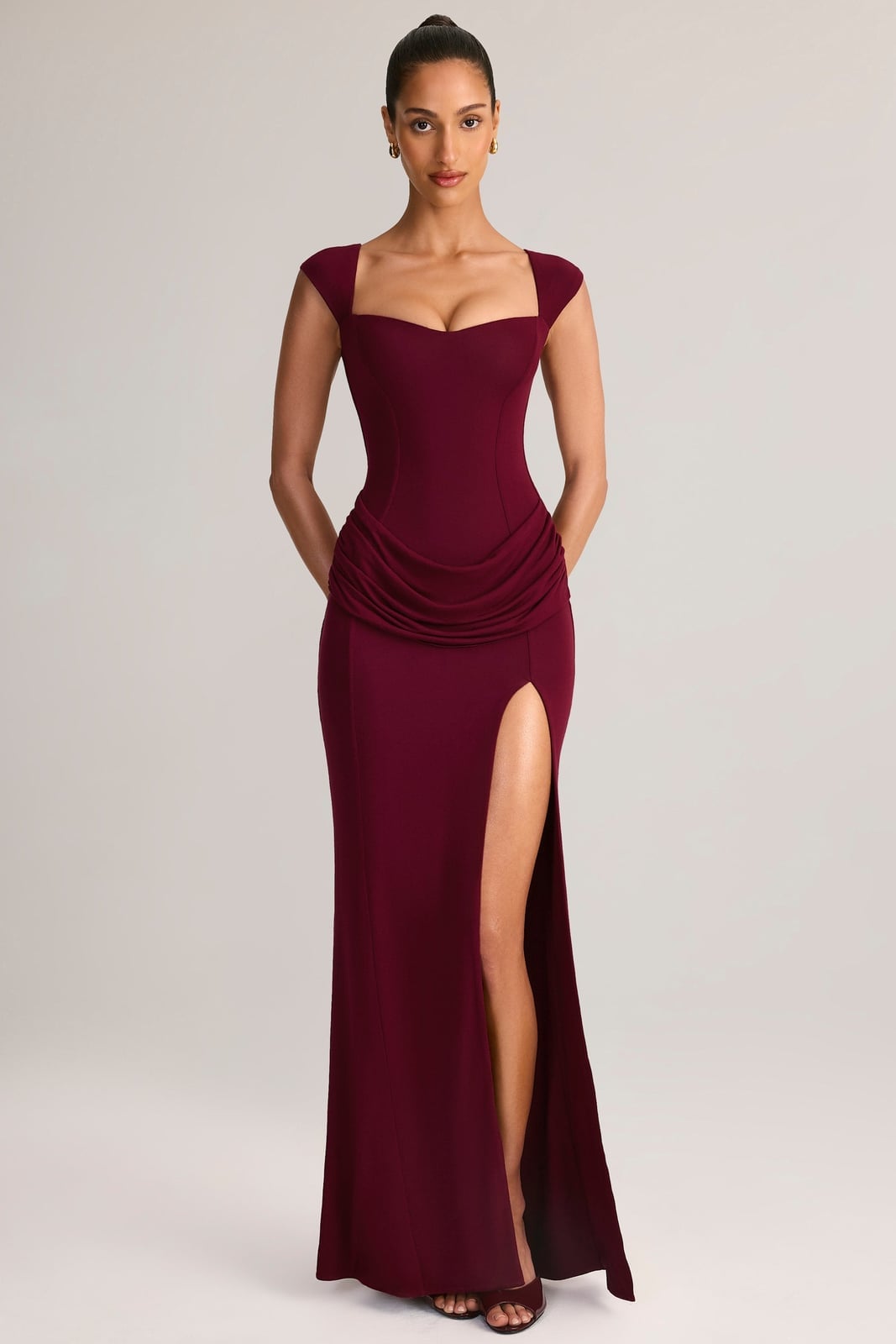 Wine Burgundy Gown With Sweetheart Neckline And High Slit Wine Burgundy Gown With Sweetheart Neckline And High Slit — Burgundy Dress